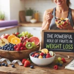 A wooden table filled with fresh fruits like grapefruit, berries, and apples, featuring a small chalkboard that reads "The Powerful Role of Fruits in Weight Loss" and a notebook listing health benefits.